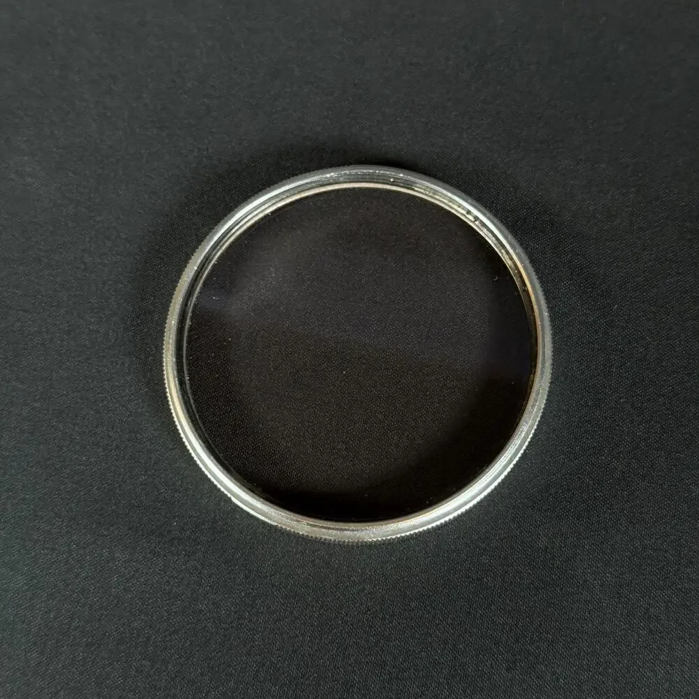 Silver Frame Canon 55mm Skylight 1x Lens Filter